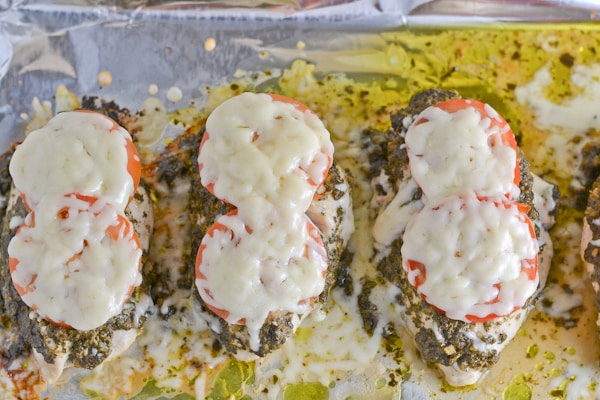 Baked Pesto Chicken with Tomato and Mozzarella Cheese