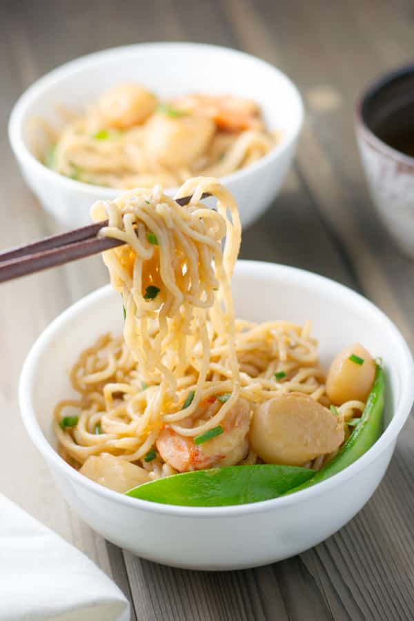 In this stir fried scallop and shrimp noodles dish, scallop & shrimp was marinated in soy sauce, sherry, sesame oil & vegetable oil and then stir-fried